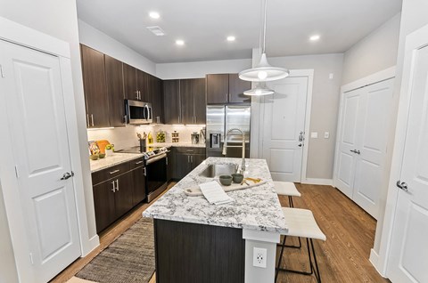 Marble kitchen island at Opal Legacy Central in Plano TX